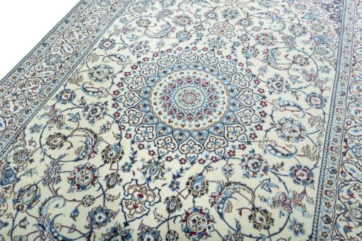 Backside of handmade 2000s Nain rug showing knot structure and weave density