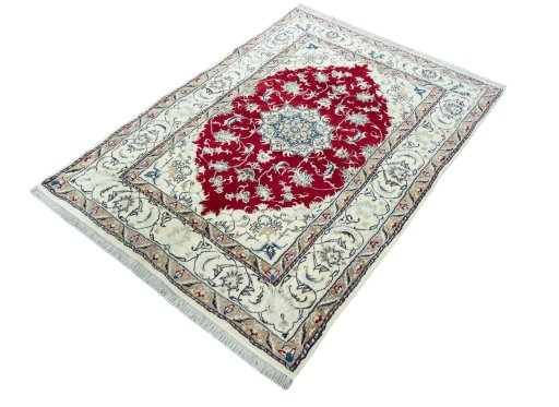Corner detail of New Nain rug showing border pattern and Wool pile