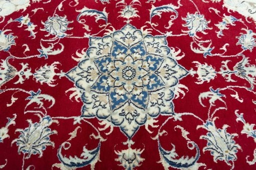 Central medallion detail of New Nain rug from Iran / Persia