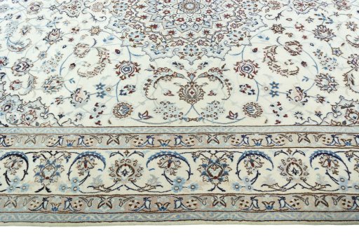 Corner detail of 2000s Nain rug showing border pattern and Wool pile