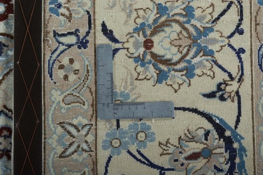 Backside of handmade 2000s Nain rug showing knot structure and weave density