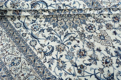 Close-up detail of 2000s Nain rug from Iran / Persia showing Wool weave