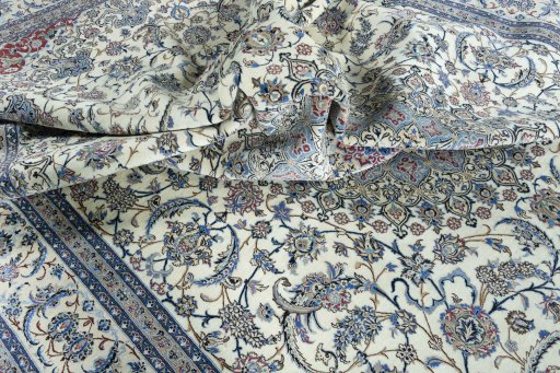 Surface texture of 2000s Nain rug with natural Cork and intricate pattern