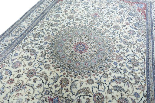 Backside of handmade 2000s Nain rug showing knot structure and weave density