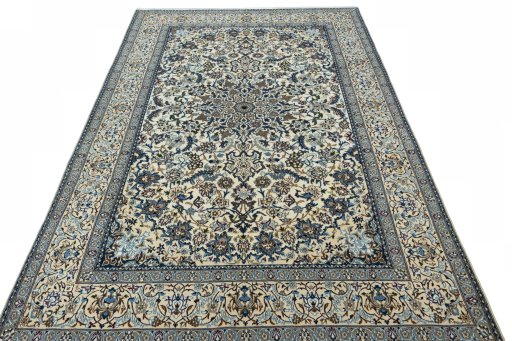 Surface texture of 2000s Nain rug with natural Wool and intricate pattern