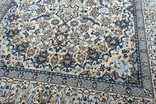 Close-up detail of 2000s Nain rug from Iran / Persia showing Wool weave