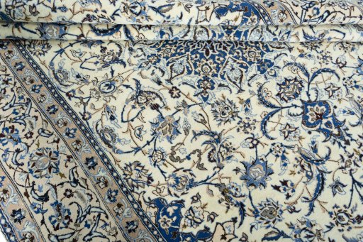 Close-up detail of 2000s Nain rug from Iran / Persia showing Wool weave