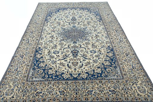Surface texture of 2000s Nain rug with natural Wool and intricate pattern