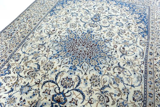 Backside of handmade 2000s Nain rug showing knot structure and weave density