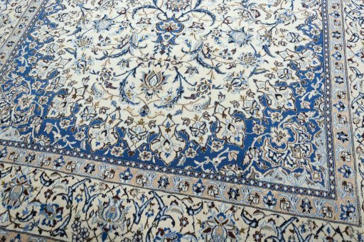 Close-up detail of 2000s Nain rug from Iran / Persia showing Wool weave