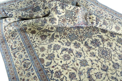 Surface texture of 2000s Nain rug with natural Cork and intricate pattern