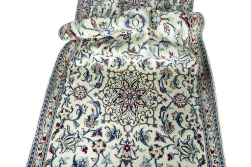 Close-up detail of 2000s Nain rug from Iran / Persia showing Wool weave