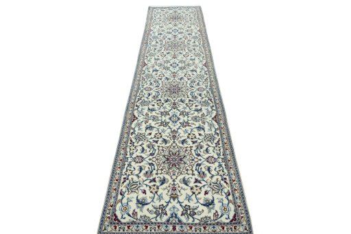 Surface texture of 2000s Nain rug with natural Wool and intricate pattern