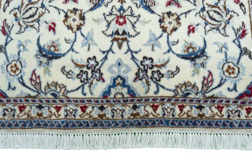 Close-up detail of 2000s Nain rug from Iran / Persia showing Wool weave