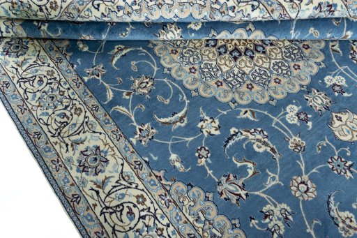 Close-up detail of 2000s Nain rug from Iran / Persia showing Wool weave