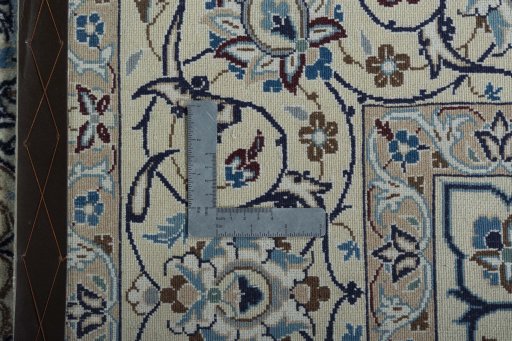 Backside of handmade 2000s Nain rug showing knot structure and weave density
