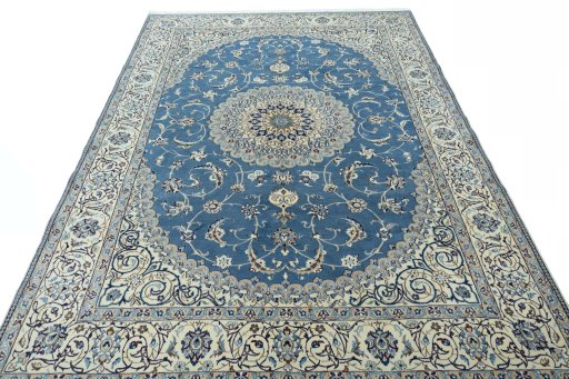 Surface texture of 2000s Nain rug with natural Wool and intricate pattern
