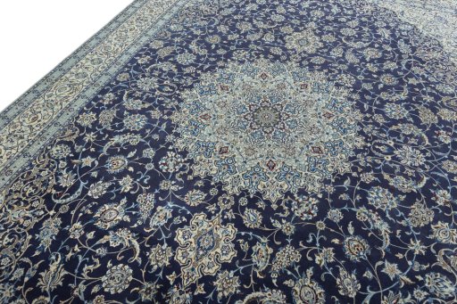 Backside of handmade 2000s Nain rug showing knot structure and weave density
