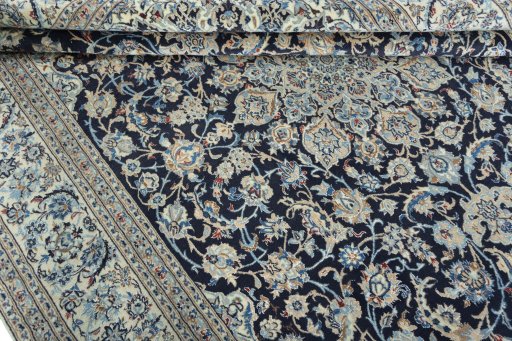 Close-up detail of 2000s Nain rug from Iran / Persia showing Wool weave