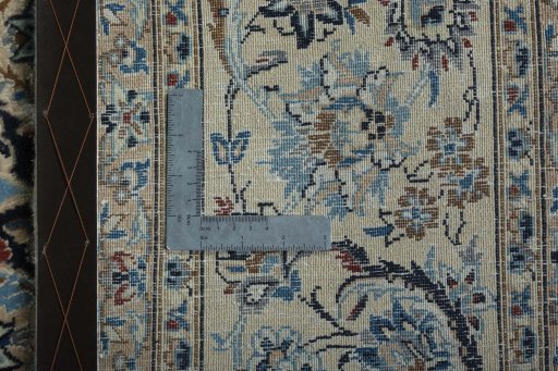 Backside of handmade 2000s Nain rug showing knot structure and weave density