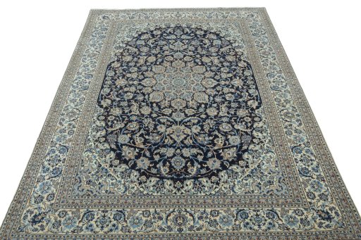 Surface texture of 2000s Nain rug with natural Wool and intricate pattern