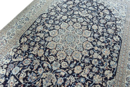 Backside of handmade 2000s Nain rug showing knot structure and weave density