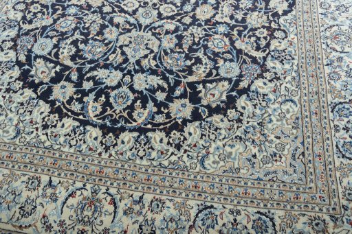 Close-up detail of 2000s Nain rug from Iran / Persia showing Wool weave