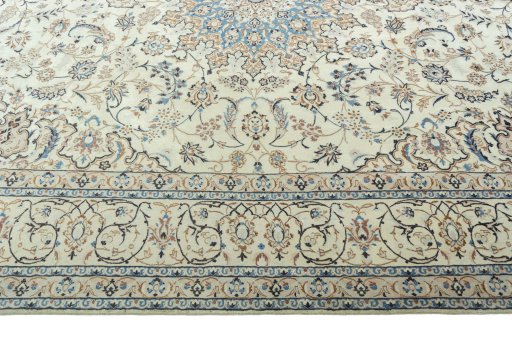 Corner detail of 2000s Nain rug showing border pattern and Wool pile