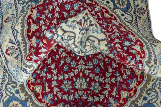 Close-up detail of 2000s Nain rug from Iran / Persia showing Wool weave