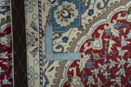 Surface texture of 2000s Nain rug with natural Wool and intricate pattern