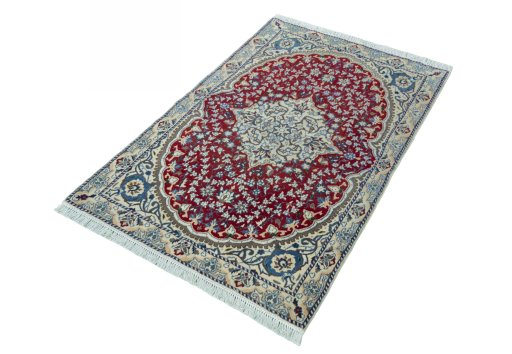 Corner detail of 2000s Nain rug showing border pattern and Wool pile