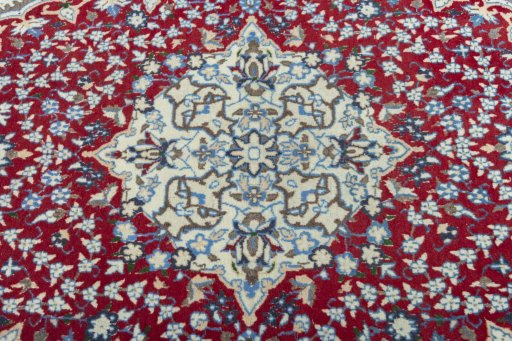Central medallion detail of 2000s Nain rug from Iran / Persia