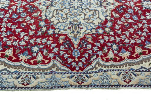 Full view of 2000s Nain rug from Iran / Persia, 132 × 86 cm in Red tones