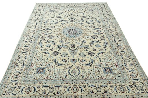 Surface texture of 2000s Nain rug with natural Wool and intricate pattern