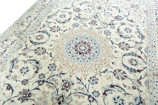 Backside of handmade 2000s Nain rug showing knot structure and weave density