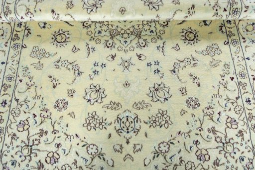 Close-up detail of 2000s Nain rug from Iran / Persia showing Wool weave