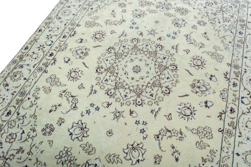 Backside of handmade 2000s Nain rug showing knot structure and weave density