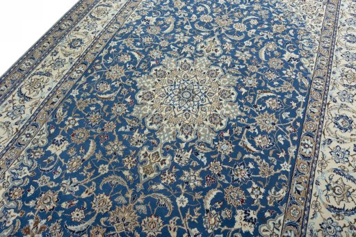 Backside of handmade 2000s Nain rug showing knot structure and weave density