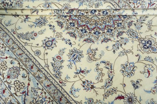 Close-up detail of 2000s Nain rug from Iran / Persia showing Wool weave