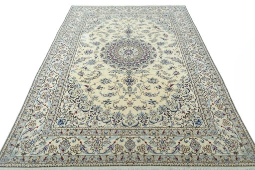 Surface texture of 2000s Nain rug with natural Wool and intricate pattern