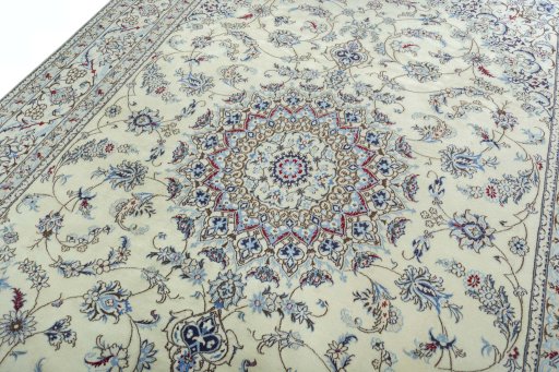 Backside of handmade 2000s Nain rug showing knot structure and weave density
