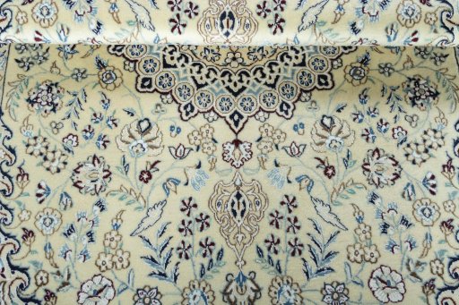 Close-up detail of 2000s Nain rug from Iran / Persia showing Wool weave