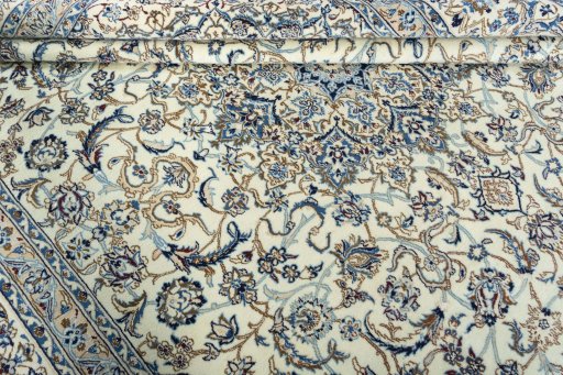 Close-up detail of 2000s Nain rug from Iran / Persia showing Wool weave