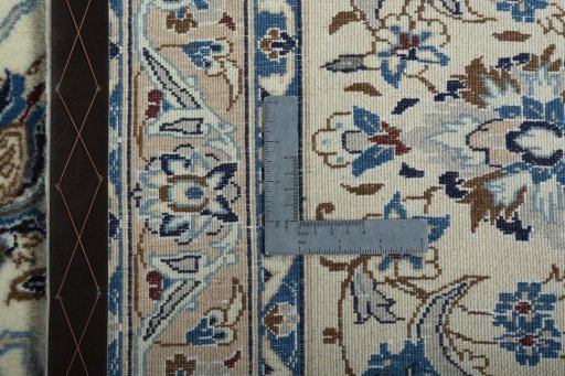 Backside of handmade 2000s Nain rug showing knot structure and weave density