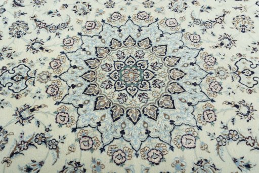Central medallion detail of 2000s Nain rug from Iran / Persia