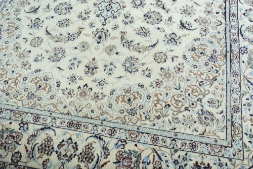 Close-up detail of 2000s Nain rug from Iran / Persia showing Wool weave