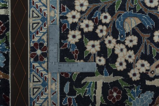 Close-up detail of 2000s Nain rug from Iran / Persia showing Wool weave