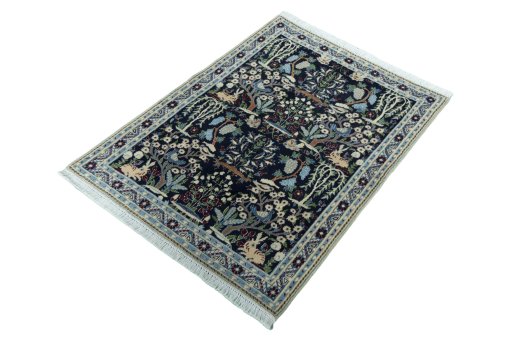 Corner detail of 2000s Nain rug showing border pattern and Wool pile