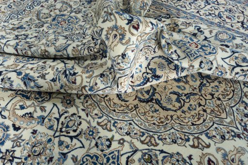 Surface texture of 2000s Nain rug with natural Wool and intricate pattern