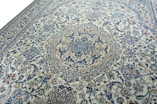 Backside of handmade 2000s Nain rug showing knot structure and weave density